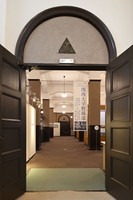 A doorway in the old library is seen on Kansai University's Senriyama Campus in Suita, Osaka Prefecture, Sept. 1, 2025. In the old library section, doors leading to the main rooms are arched at the top and adorned with grape-patterned reliefs. (Mainichi/Tsutomu Koseki)