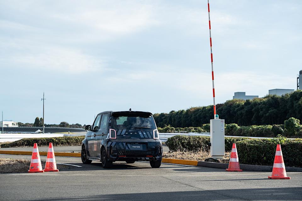 Driving the Honda Super-One on a test track near Tochigi, Japan