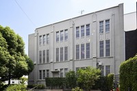 The old library section with many tall, narrow Gothic-style windows is seen on Kansai University's Senriyama Campus in Suita, Osaka Prefecture, Aug. 29, 2025. (Mainichi/Tsutomu Koseki)