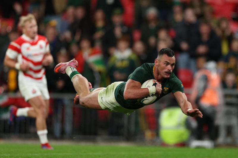 South Africa centre Jesse Kriel dives over the line to score a try during the Autumn Nations Series match against Japan at Wembley Stadium. Photograph: Adrian Dennis/AFP via Getty Images