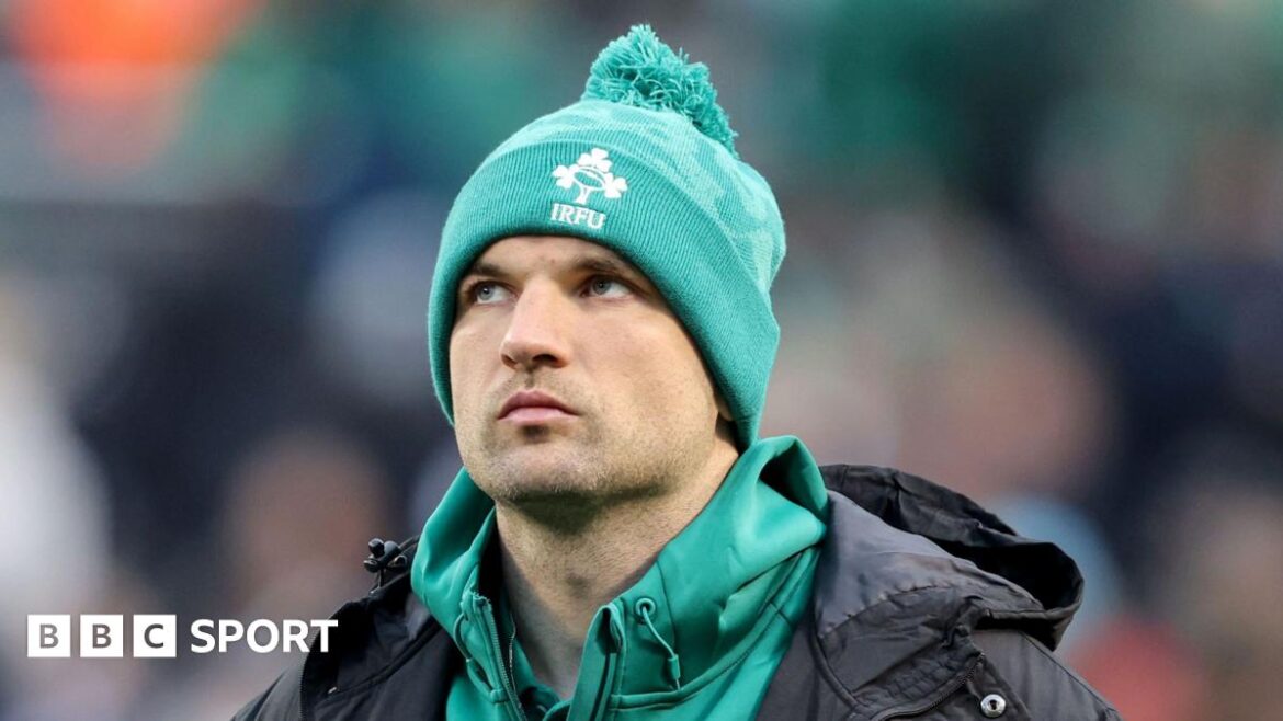 Tadhg Beirne looks dejected after his red card against the All Blacks