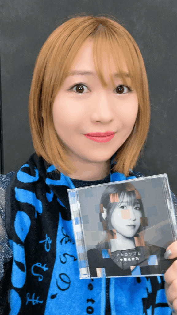 Yasuno Kiyono with Her New Single on Display