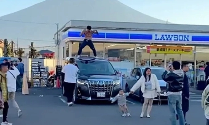 Thai YouTuber draws backlash after dancing shirtless on car roof at Mount Fuji view site