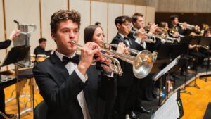 trumpet players perform