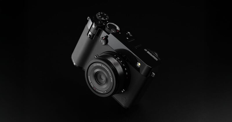 A sleek, black digital camera with a lens and various control dials is displayed on a dark background, showcasing its modern and minimalist design.