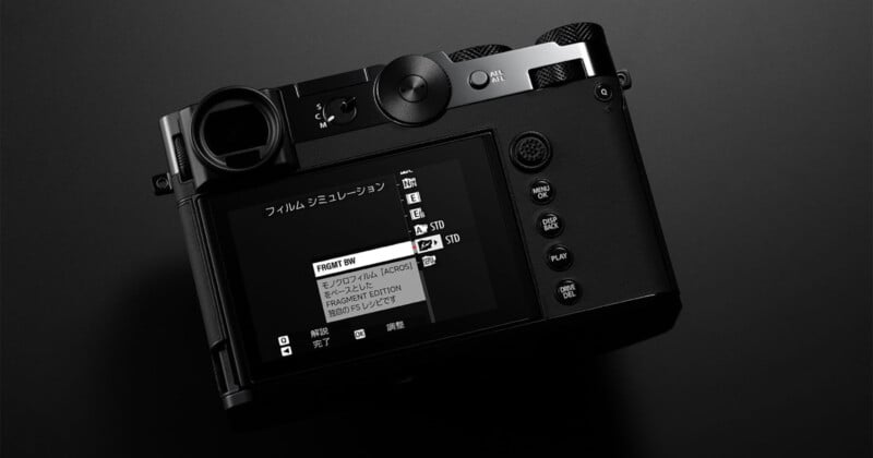 A black digital camera is shown from above on a dark background, displaying its screen menu with various film simulation options in Japanese and English. The camera buttons and dials are clearly visible.