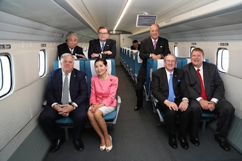 Then-Maryland governor Larry Hogan and his wife, Yumi, joined executives from the Central Japan Railway Company (JR Central) and the Baltimore-Washington Rapid Rail LLC (BWRR) to ride the 27-mile-long Yamanashi Maglev Line located outside of Tokyo, Japan, on June 4, 2015.