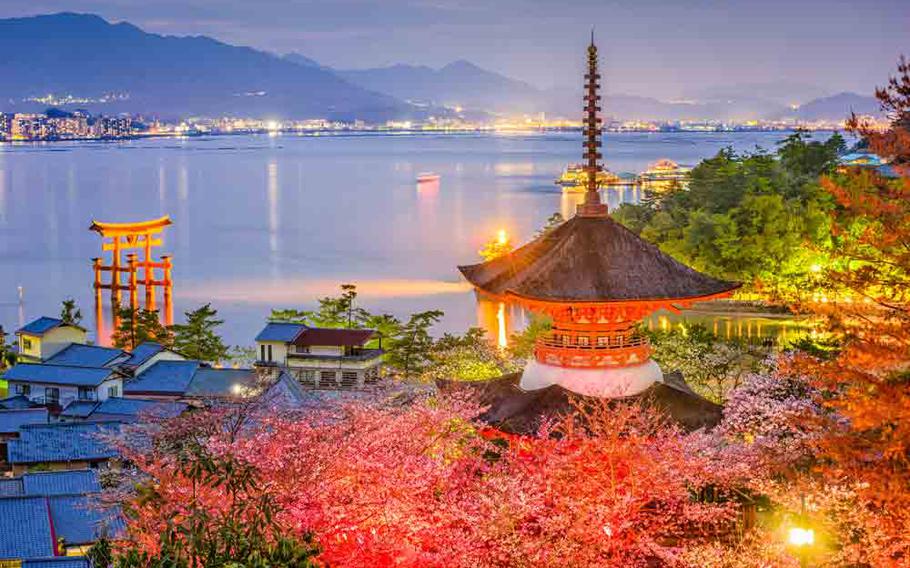 View of Miyajima and fall foliage from a hill.