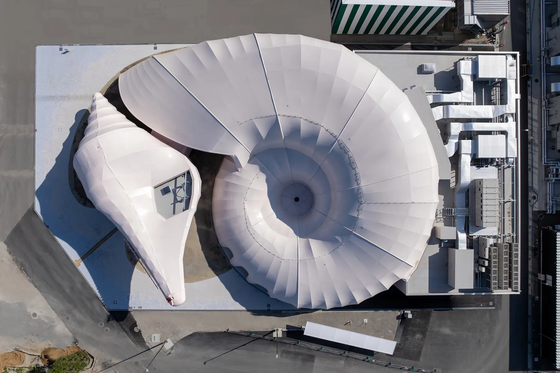 Pasona Natureverse Pavilion at the 2025 Osaka World Expo. The structure resembles a monumental seashell.