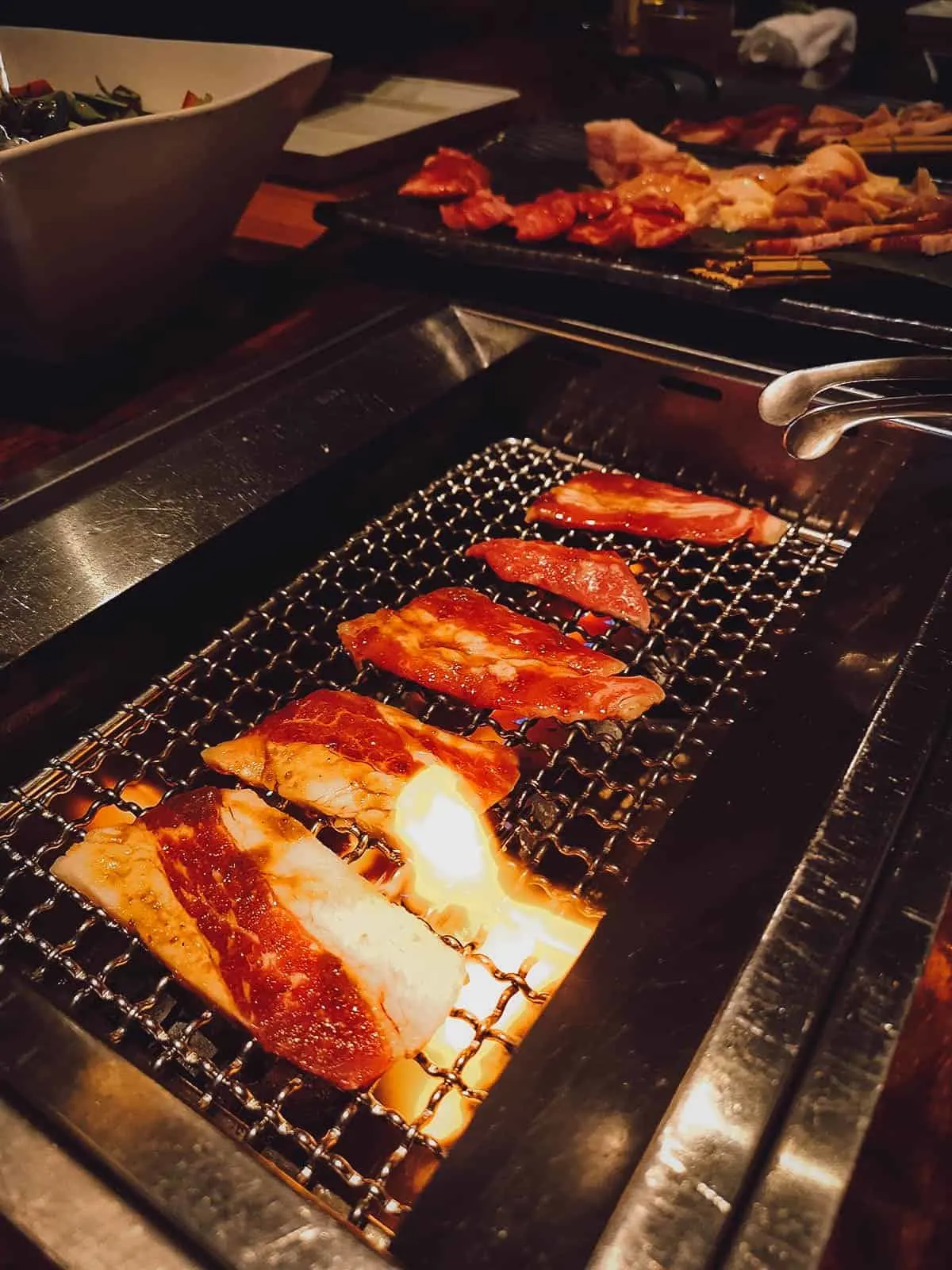 The Best Fukuoka Food and Restaurants Grilling meat at Yakiniku Nurubon in Fukuoka
