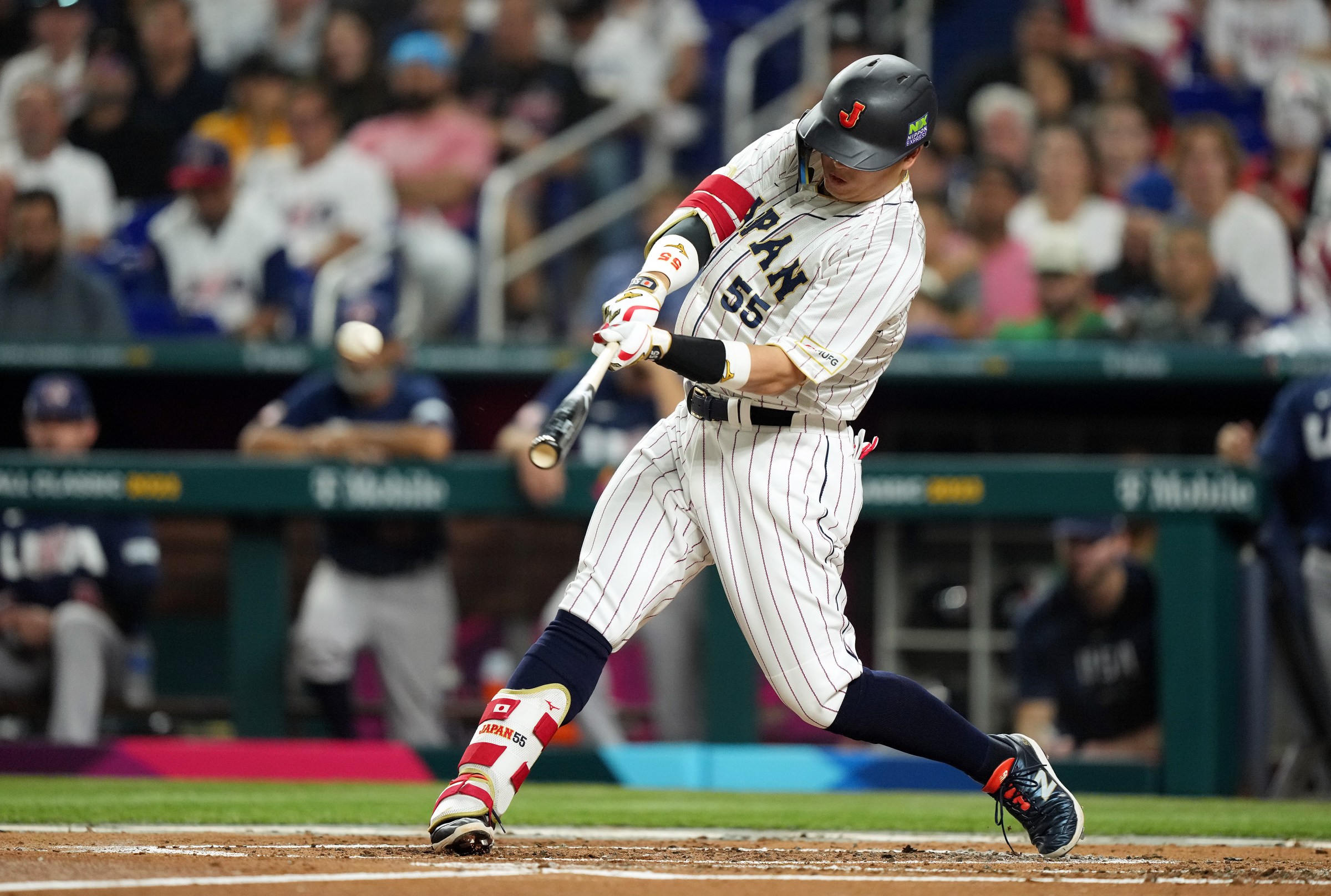 MIAMI, FLORIDA - MARCH 21: Munetaka Murakami #55 of Team Japan hits a solo home run in the second inning against Team USA during the World Baseball Classic Championship at loanDepot park on March 21, 2023 in Miami, Florida. (Photo by Eric Espada/Getty Images)