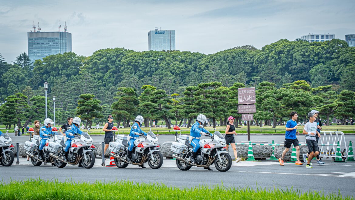 Police motorcade preparing to escort Emperor from the Imperial Palace to the Tokyo Station
