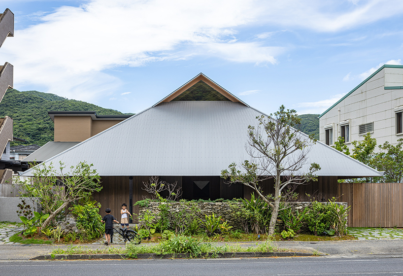 five interconnected timber volumes shape off-grid house on japanese island