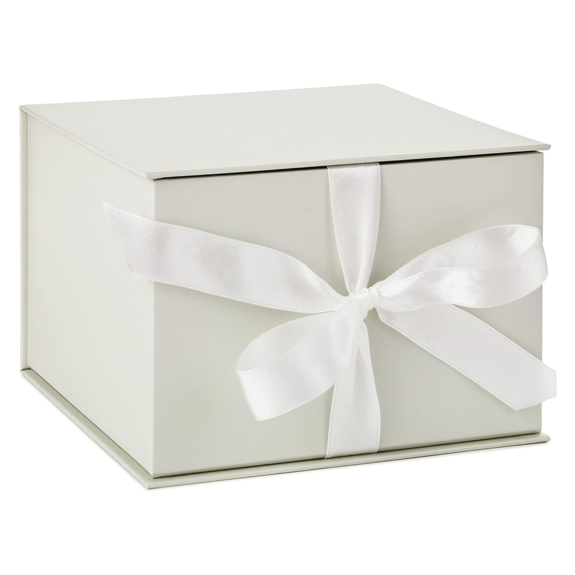 White gift box with a white ribbon