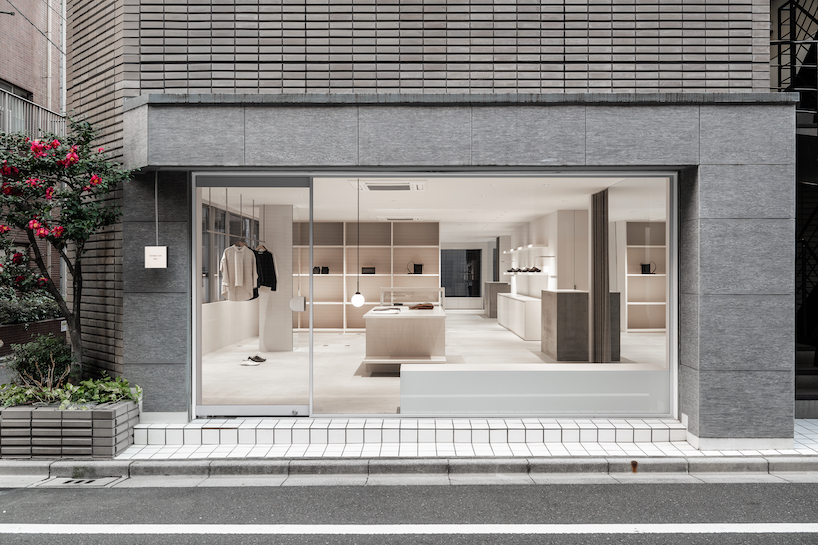 white-stained wood shapes soft bright interiors for tokyo apparel store