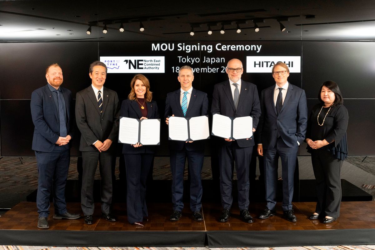 North East mayor Kim McGuinness and Port of Tyne CEO Matt Beeton sign a Memorandum of Understanding with representatives of Hitachi