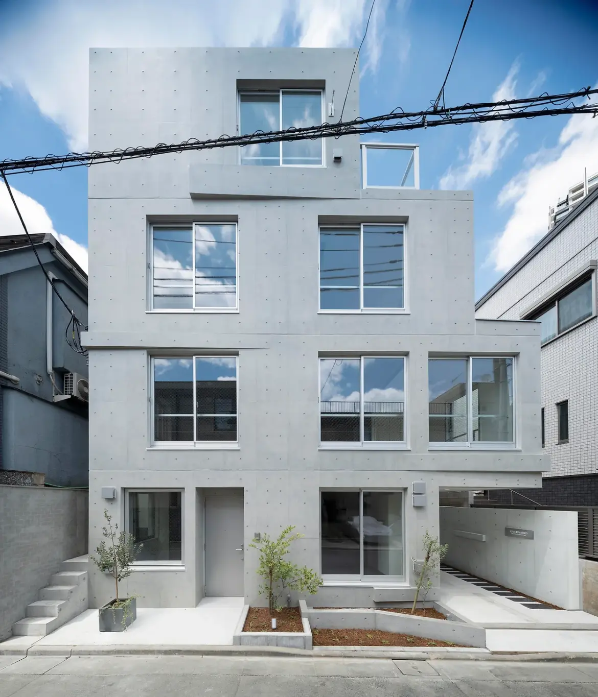 On a Hillside in Tokyo, These Homes Rise From the Rock