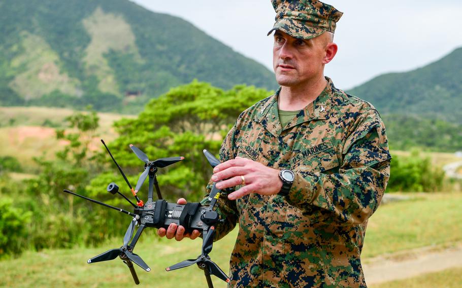 Col. Scott Cuomo, commander of Weapons Training Battalion in Quantico, Va., speaks with media on drone technology during an attack drone competition on Camp Schwab, Okinawa, Dec. 11, 2025.