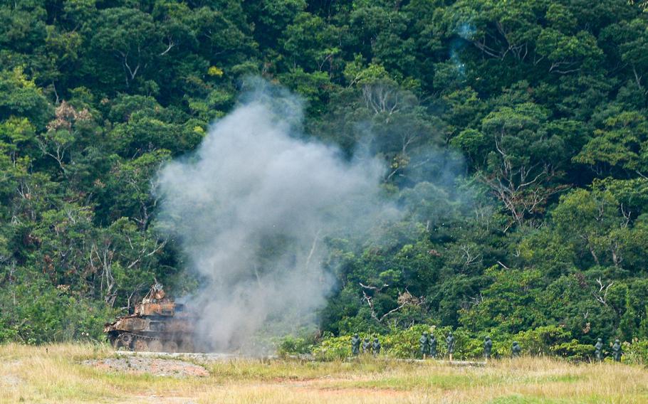 Drones operated by Marines drop explosives on training target during an attack drone competition on Camp Schwab, Okinawa, Dec. 11, 2025.