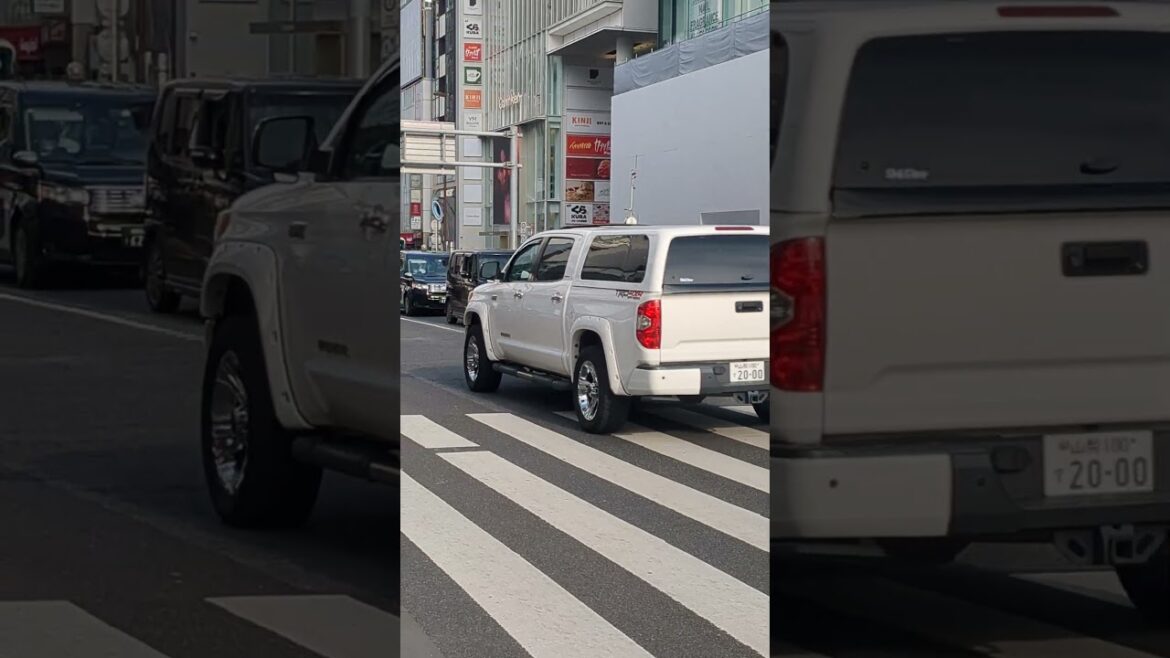 A gorgeous white Jeep passing through Harajuku, Tokyo, Japan. A gorgeous white Jeep passing through Harajuku, Tokyo, Japan.