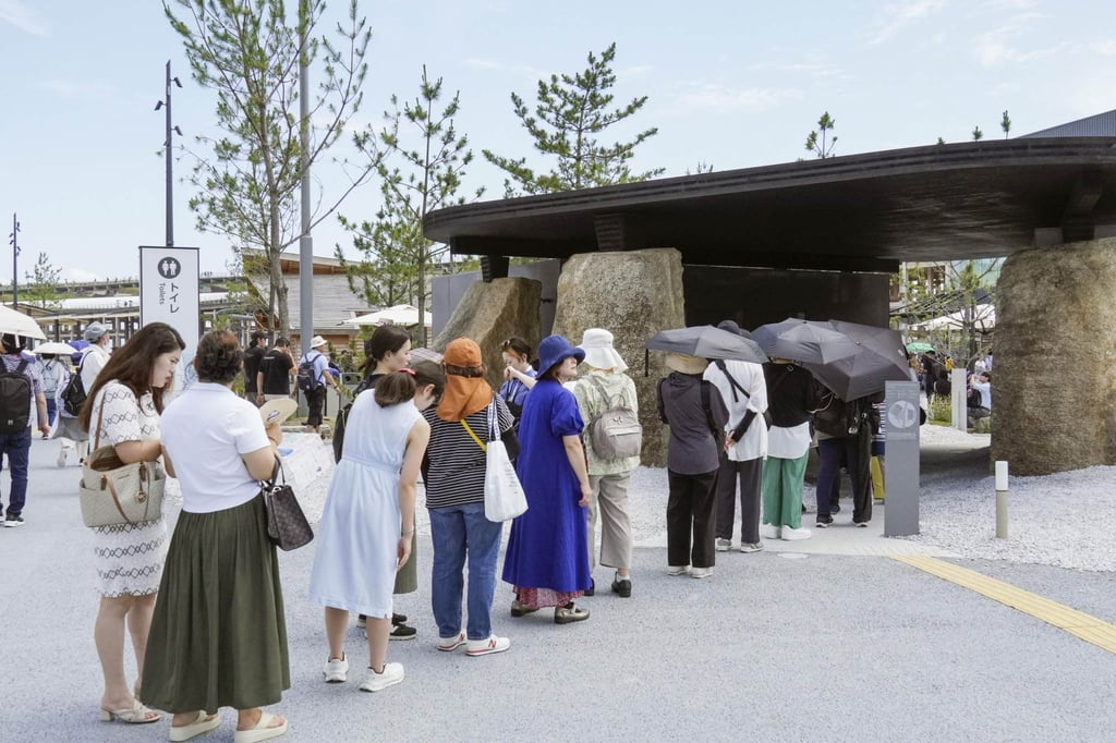 Women queue for a toilet at the World Exposition in Japan’s Osaka in June. Women MPs in parliament often face queues for the toilet too. Photo: Kyodo