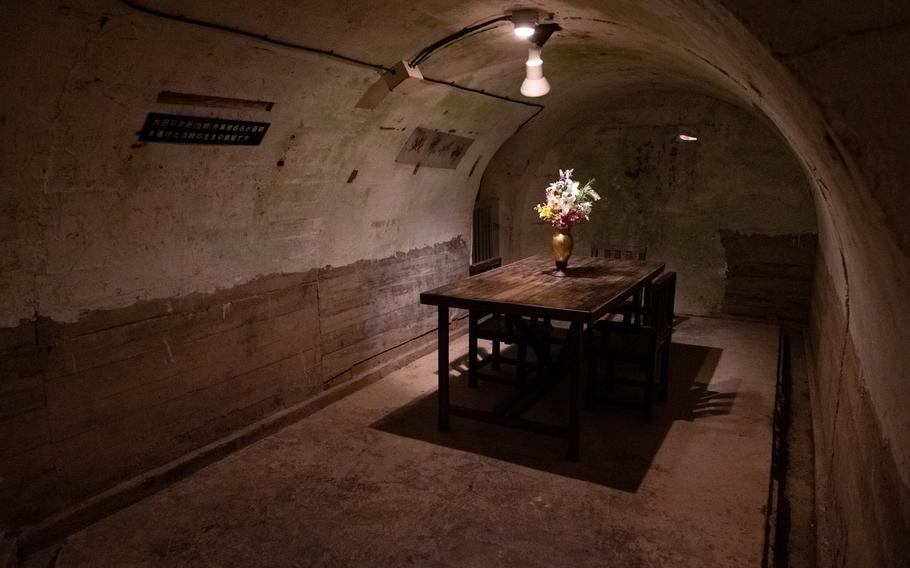 A flower vase on the table in the banker.