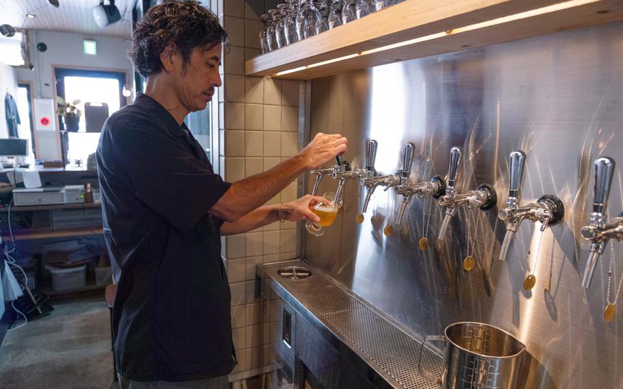 Cliff Miyagi pouring beer