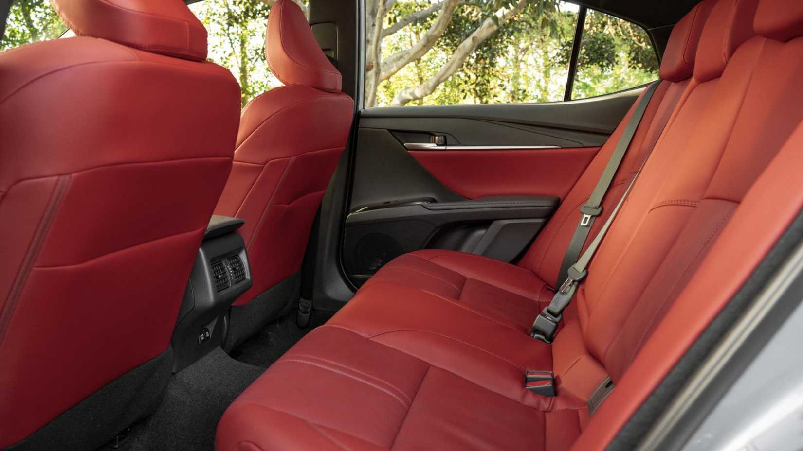 Shot of the rear seats in a 2026 Toyota Camry XSE AWD with red leather.