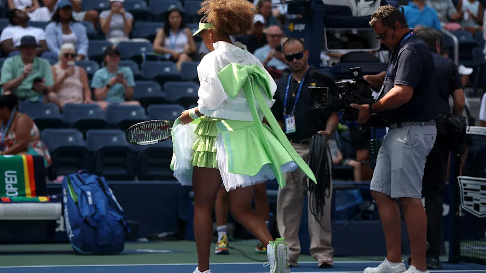 Naomi Osaka of Japan walks on court before playing against Jelena Ostapenko of Latvia during their Women's Singles First Round match on Day Two of the 2024 US Open at the USTA Billie Jean King National Tennis Center on August 27, 2024.Mike Stobe/Getty Images