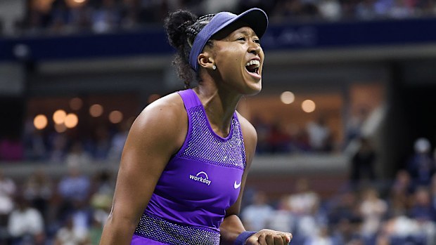 Naomi Osaka of Japan celebrates after winning the first set against Amanda Anisimova.