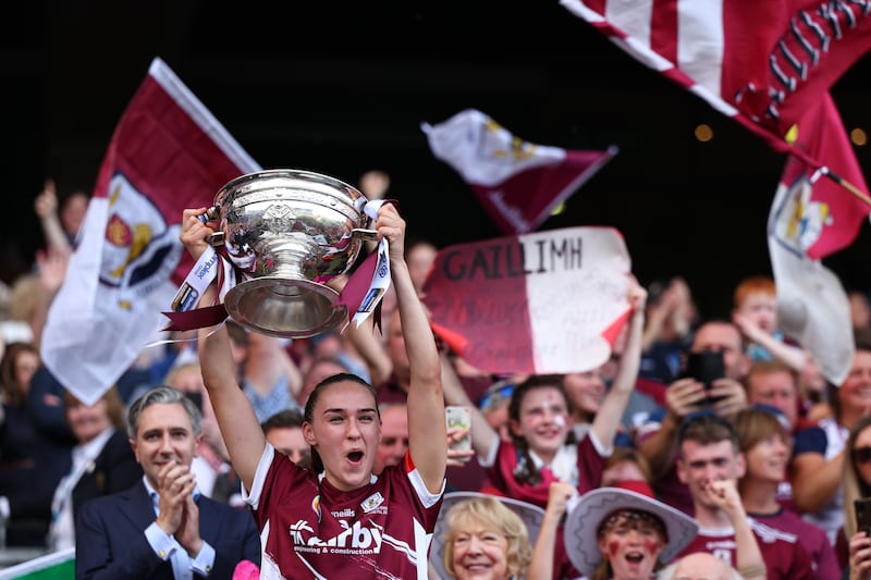Galway’s Carrie Dolan lifts the All-Ireland senior camogie trophy at Croke Park in August. Photograph: Ben Brady/INPHO