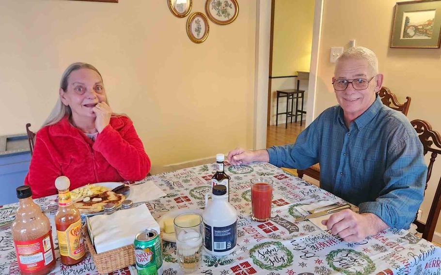 a couple at the dining table