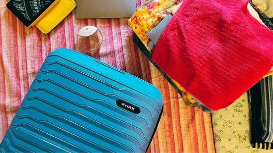 This blue cabin HRX suitcase is ready to get packed for easy airport moves and short trips.(Hindustan Times)