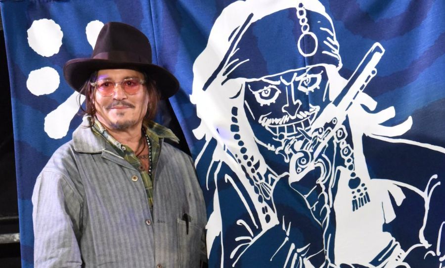 Johnny Depp posing with a noren curtain depicting Jack Sparrow in One Piece style by Eiichiro Oda
