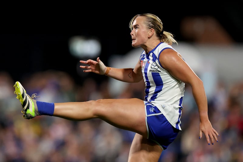 Vikki Wall of the Kangaroos kicks a goal during the AFLW final against Brisbane Lions in November. Photograph: Jonathan DiMaggio/Getty