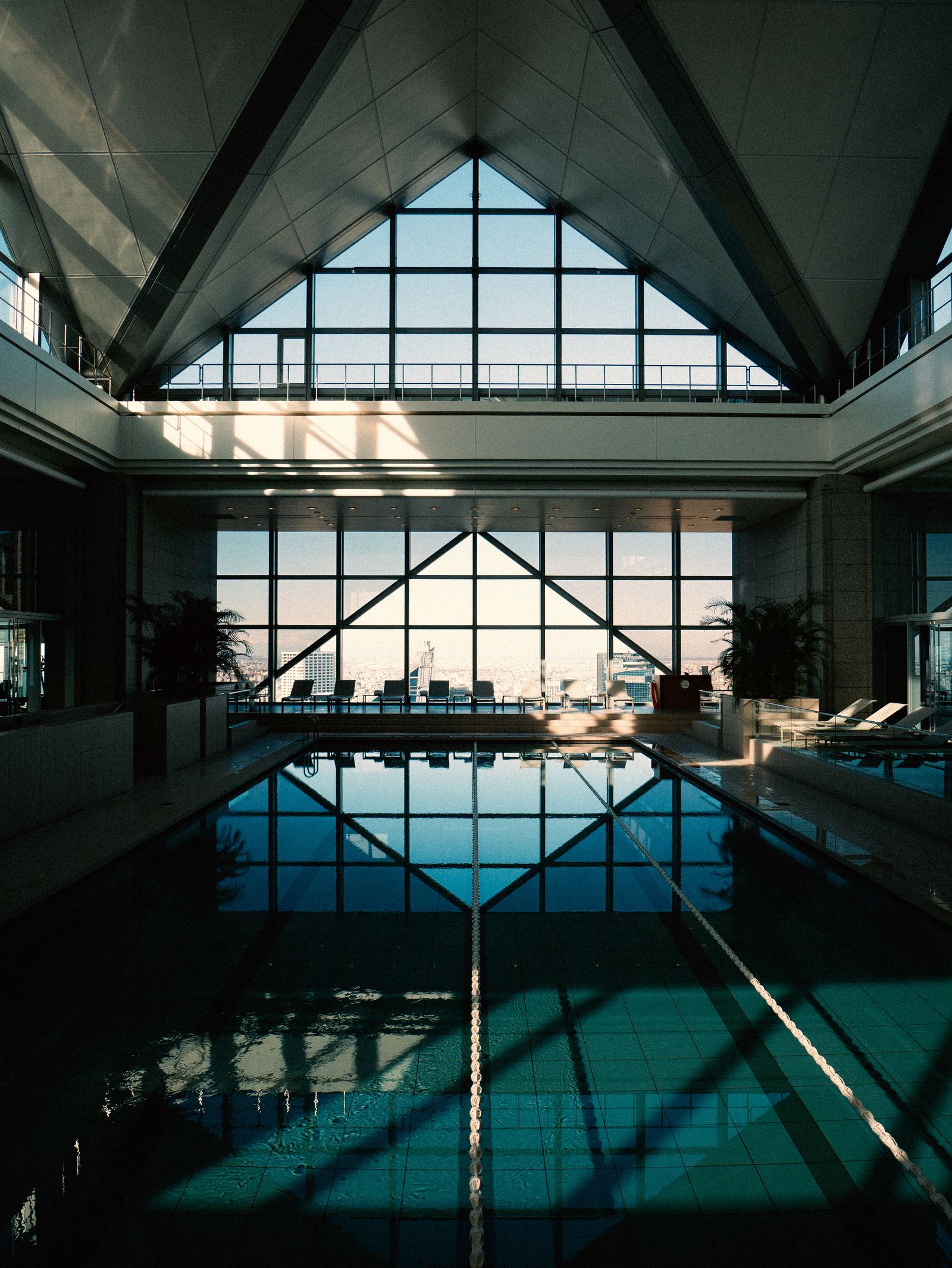 Image may contain Pool Water Architecture Building Swimming Pool Floor Office Building Window Hotel and Resort