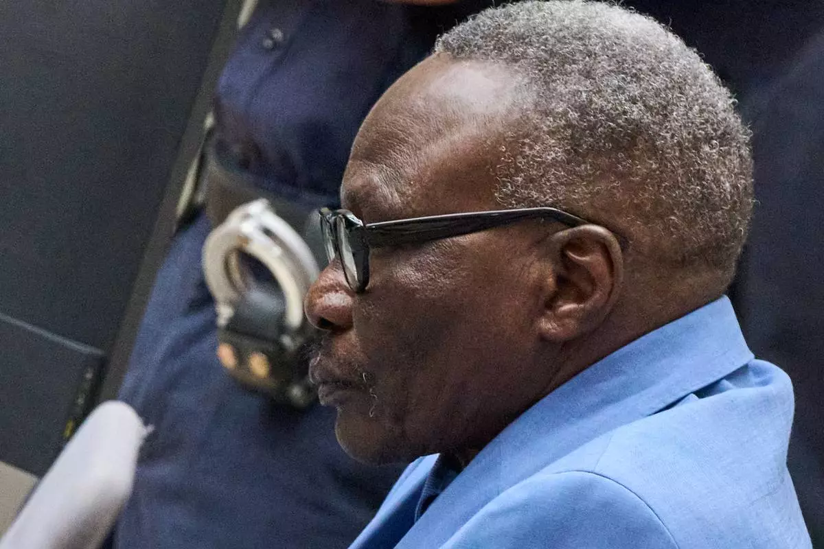 Ali Muhammad Ali Abd al-Rahman, a leader of the Sudanese Janjaweed militia, at the International Criminal Court, ICC, in The Hague, Netherlands, Tuesday, Dec. 9, 2025. (AP Photo/Peter Dejong, Pool)