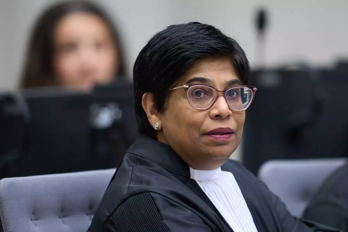 Deputy Prosecutor of the International Criminal Court Nazhat Shameem Khan waits to hear the verdict of the International Criminal Court, ICC, for Ali Muhammad Ali Abd al-Rahman, a leader of the Sudanese Janjaweed militia, in The Hague, Netherlands, Tuesday, Dec. 9, 2025. (AP Photo/Peter Dejong, Pool)