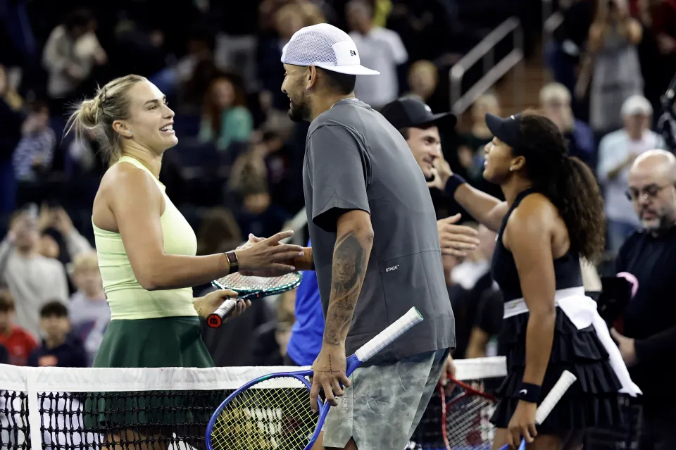 Aryna Sabalenka and Tommy Paul of the United States congratulate Naomi Osaka of Japan and Nick Kyrgios of Australia on winning their mixed doubles match during the Garden Cup at Madison Square Garden on December 08, 2025 in New York City.