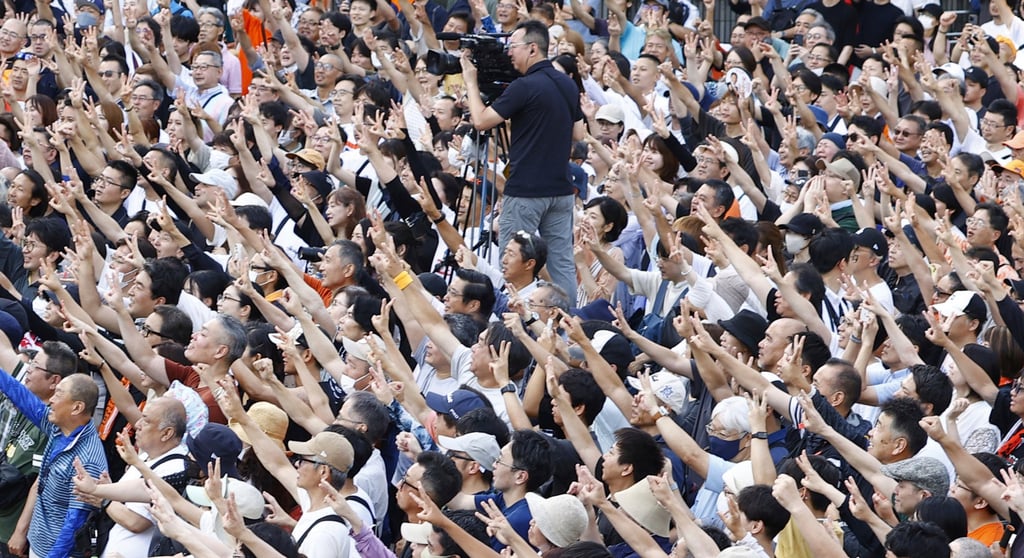 Sanseito supporters gather during an election campaign in Yokohama on July 19. Photo: Kyodo/AP