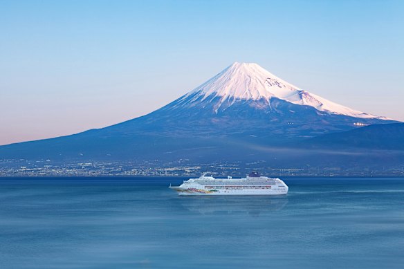 Norwegian Sky sailing past Mount Fuji in Japan.