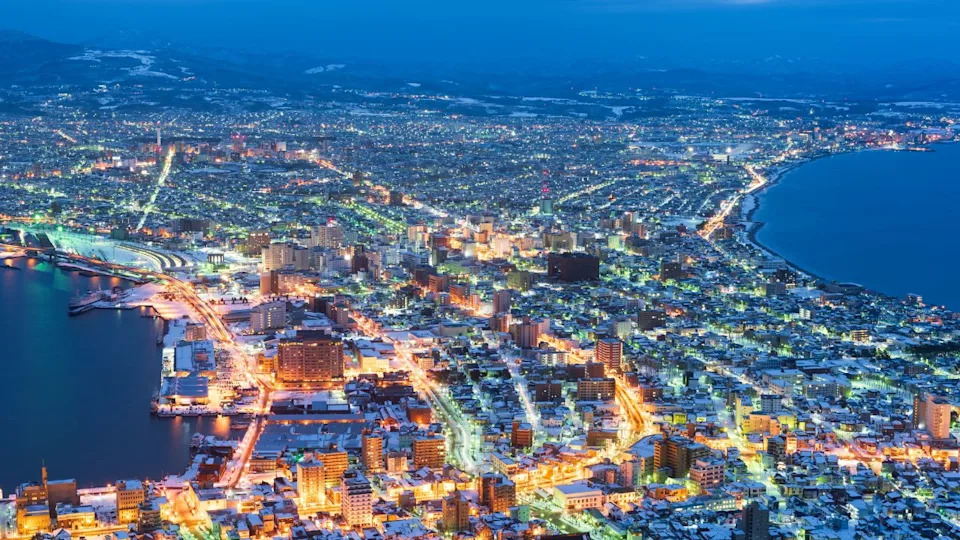 Hakodate, Hokkaido, Japan city skyline from Mt. Hakodate at dusk.