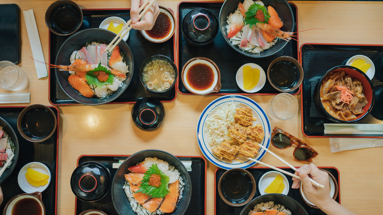 aerial view of a table filled with japanese dishes