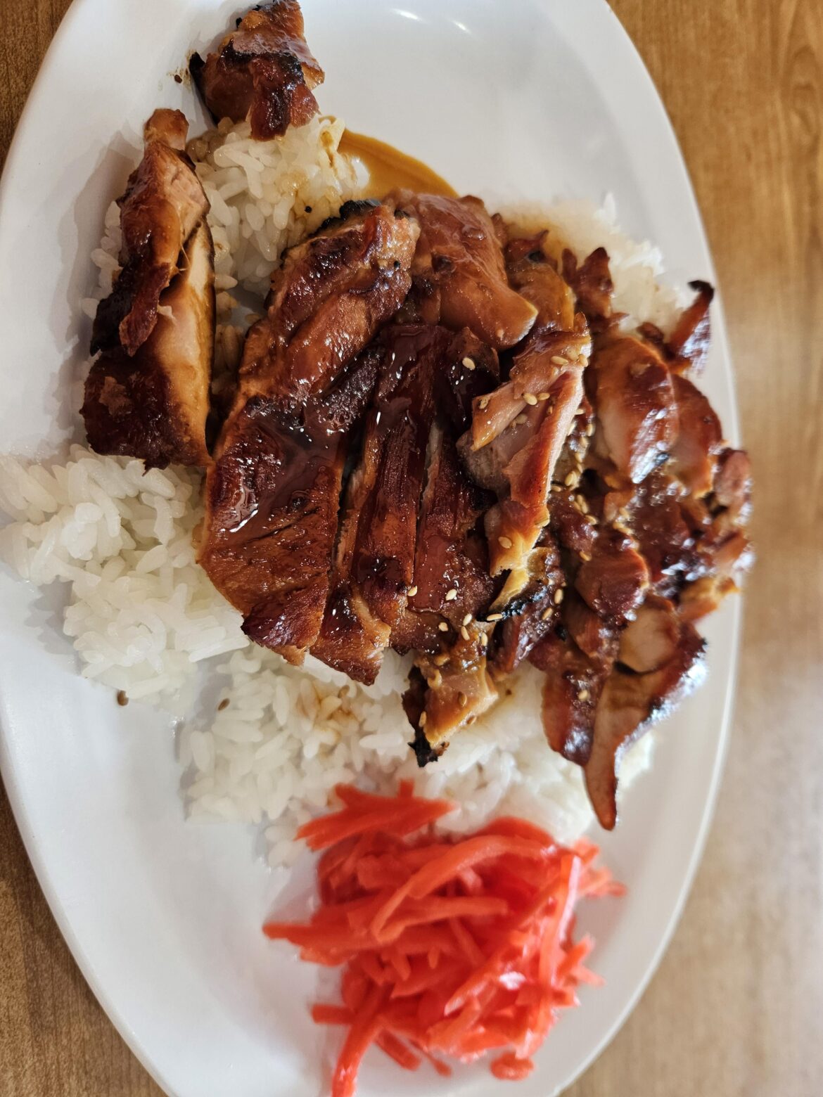 A simple plate of rice and teriyaki chicken
