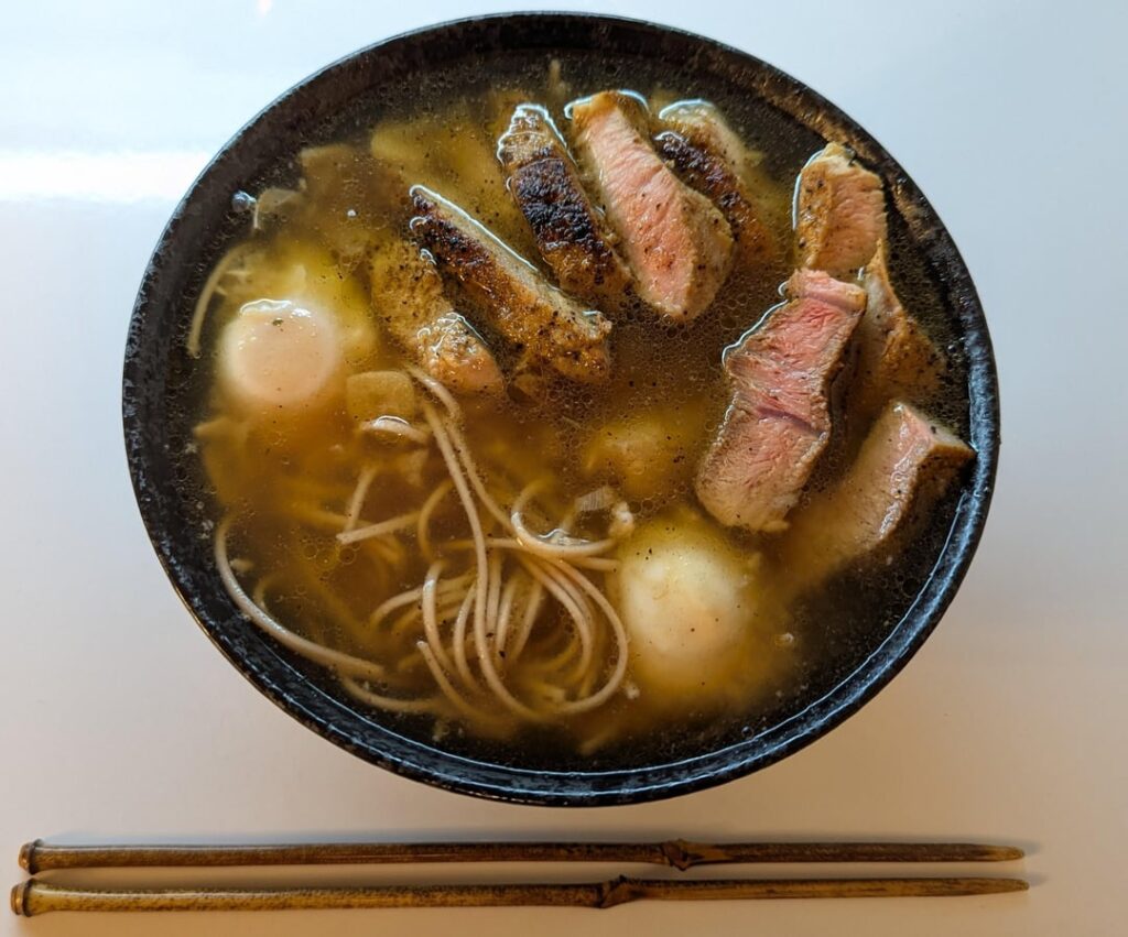soba in ginger, garlic dashi w/ pork shoulder.
