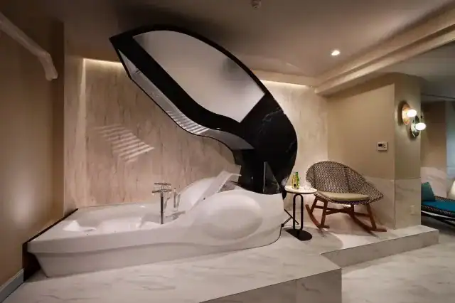 The Human Washing Machine in a bathroom setting