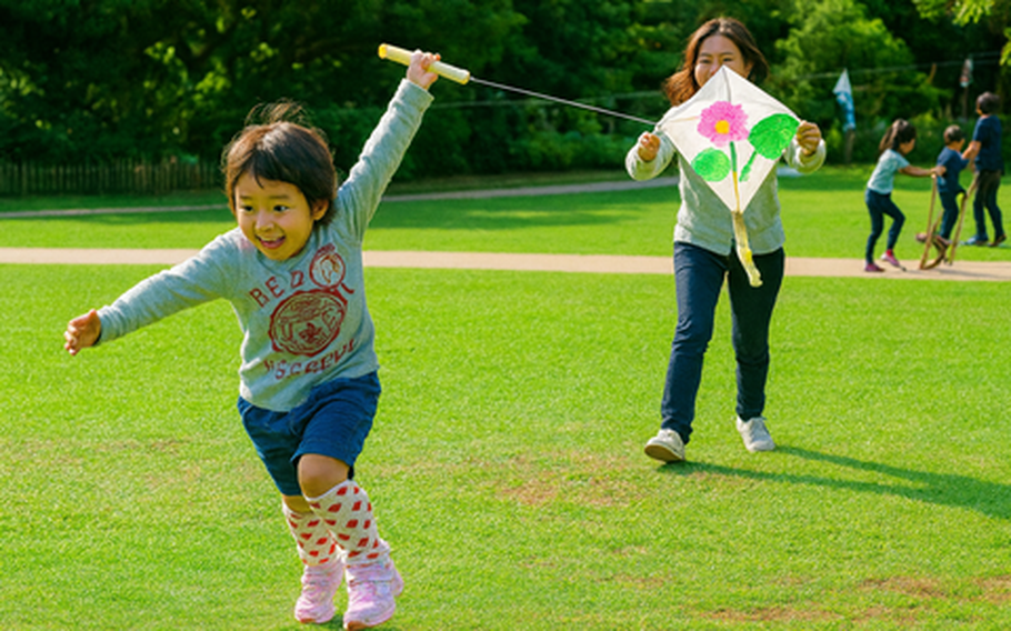 A child running to fly a kite (a mother holding it to support).