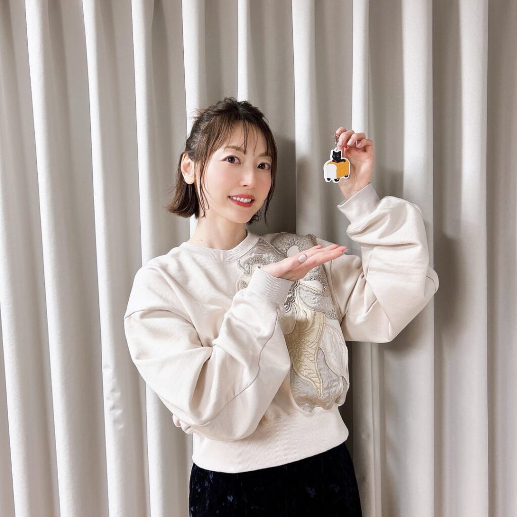 Hanazawa Kana with the PolKana Gassen Merch