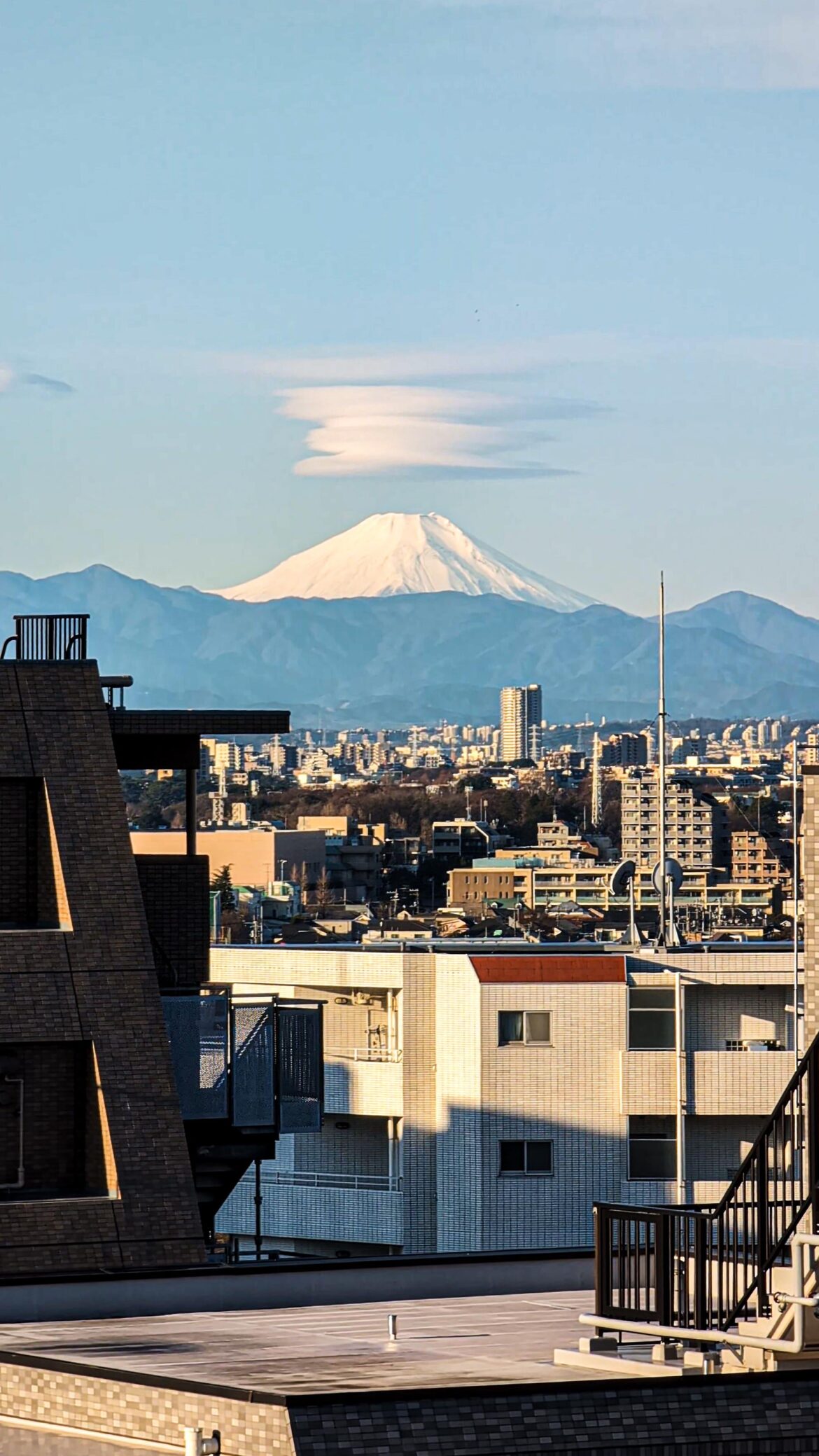 Mount Fuji this morning with lenticular clouds (view from Tokyo)