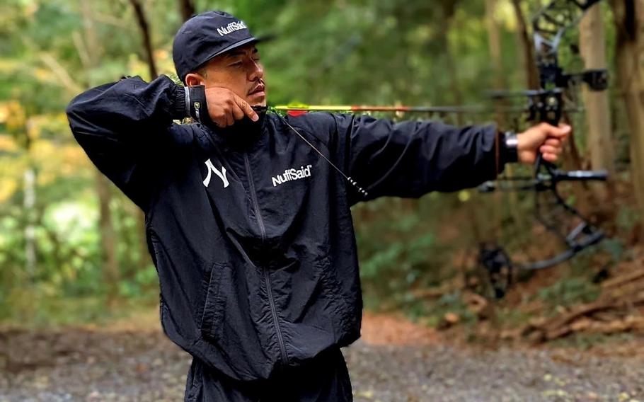 Japanese hip-hop artist AK-69 visited the archery trail at Tama Hills Recreation Area in Tokyo on Nov. 16, 2025, where he practiced shooting foam animal targets.